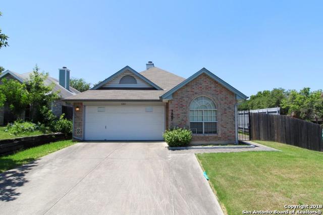 5887 Spring Cabin San Antonio, TX 78247 - Photo 1 of 1 a front view of a house with garden