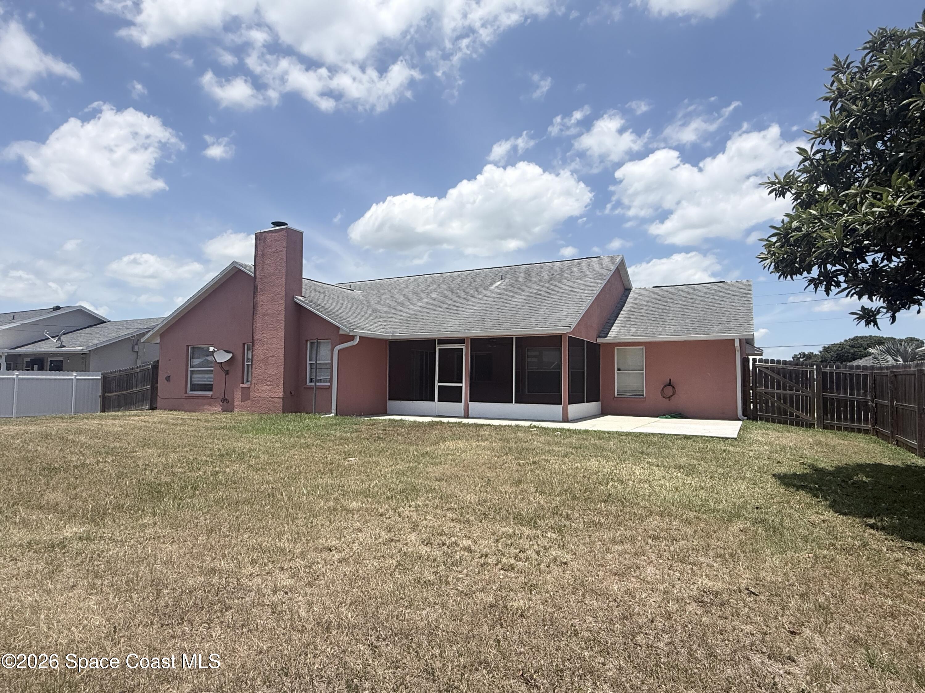 1660 Wake Forest Road Northwest Palm Bay, FL 32907 - Photo 5 of 15 Spacious backyard