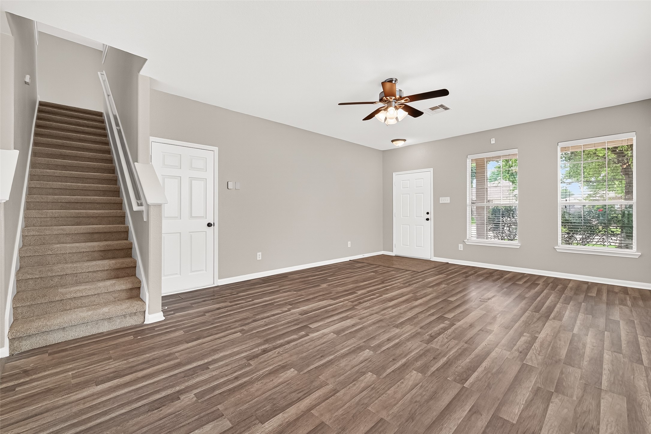 21327 Bella Flora Court Spring, TX 77379 - Photo 8 of 50 wooden floor in an empty room with a window