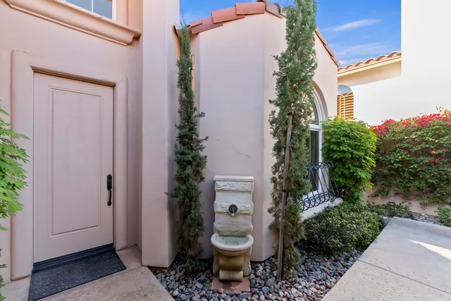 a view of a potted plants in front of a door