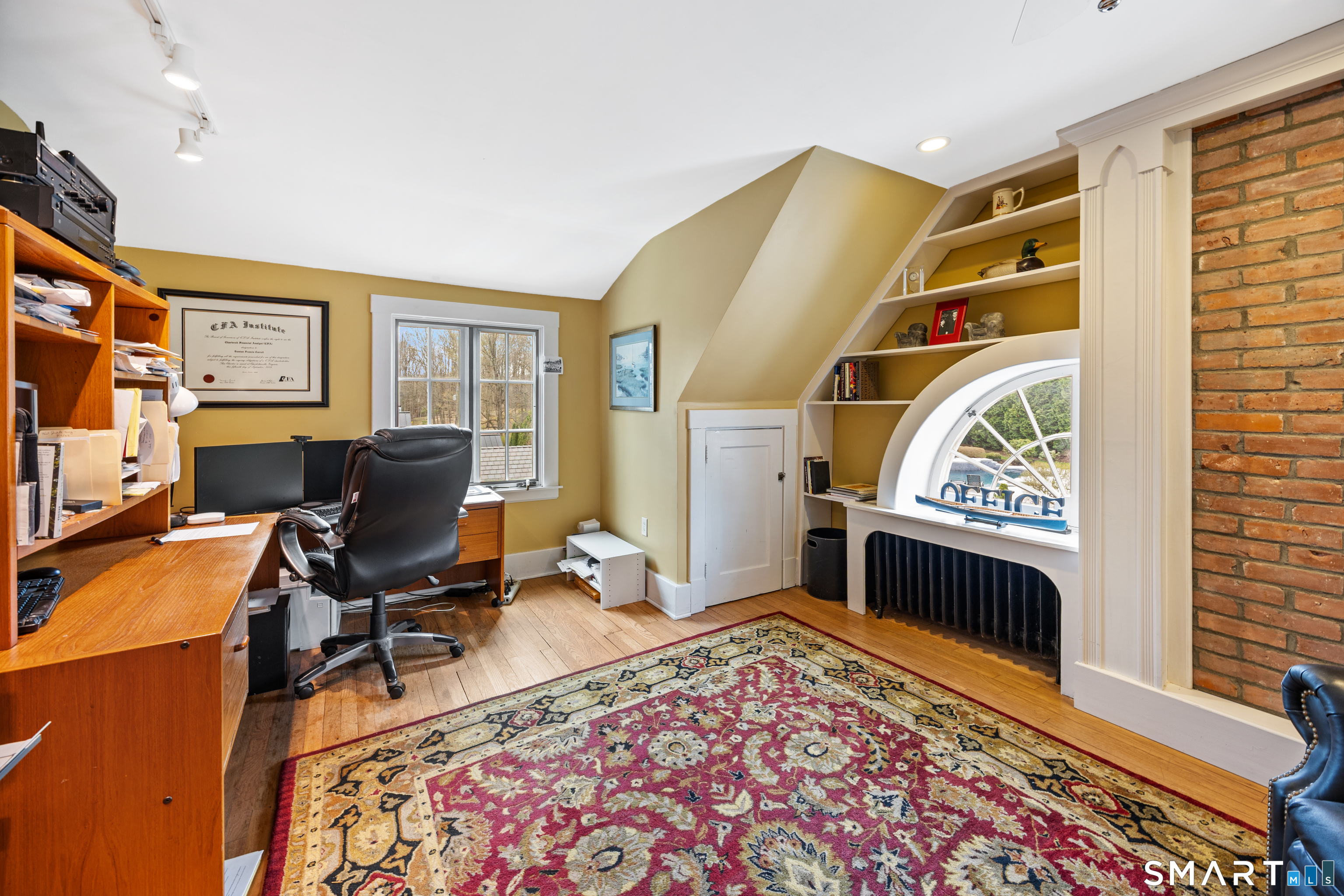40 10 Acre Road New Britain, CT 06052 - Photo 30 of 38 a workspace with furniture and a rug