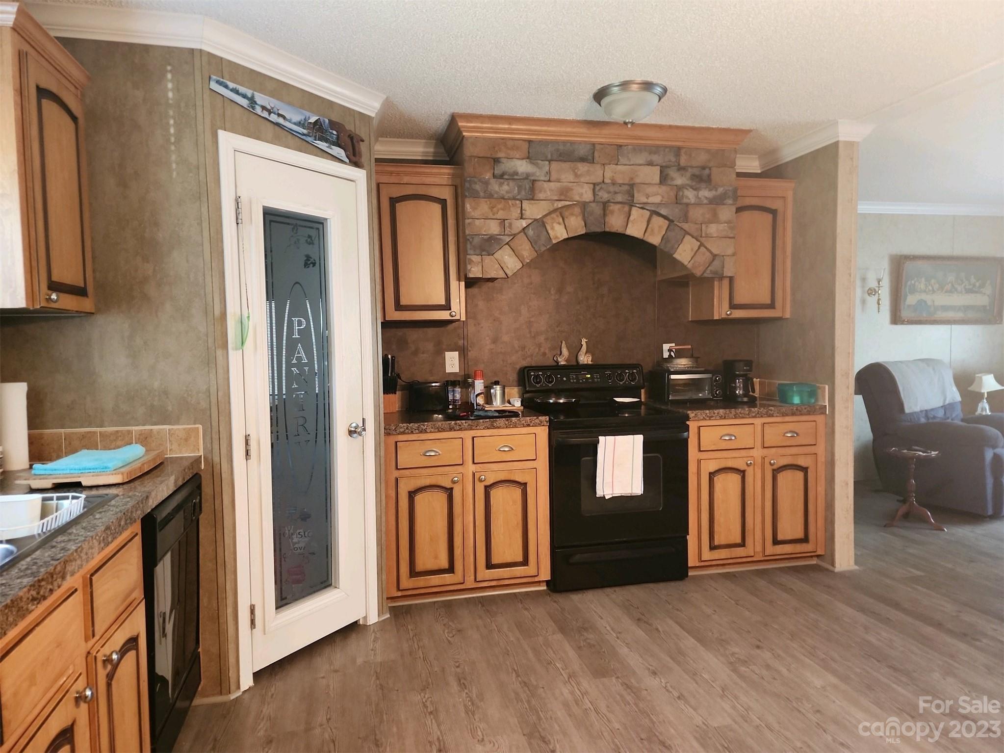 626 Union School Road McBee, SC 29101 - Photo 11 of 19 a kitchen with stainless steel appliances granite countertop a stove and a sink