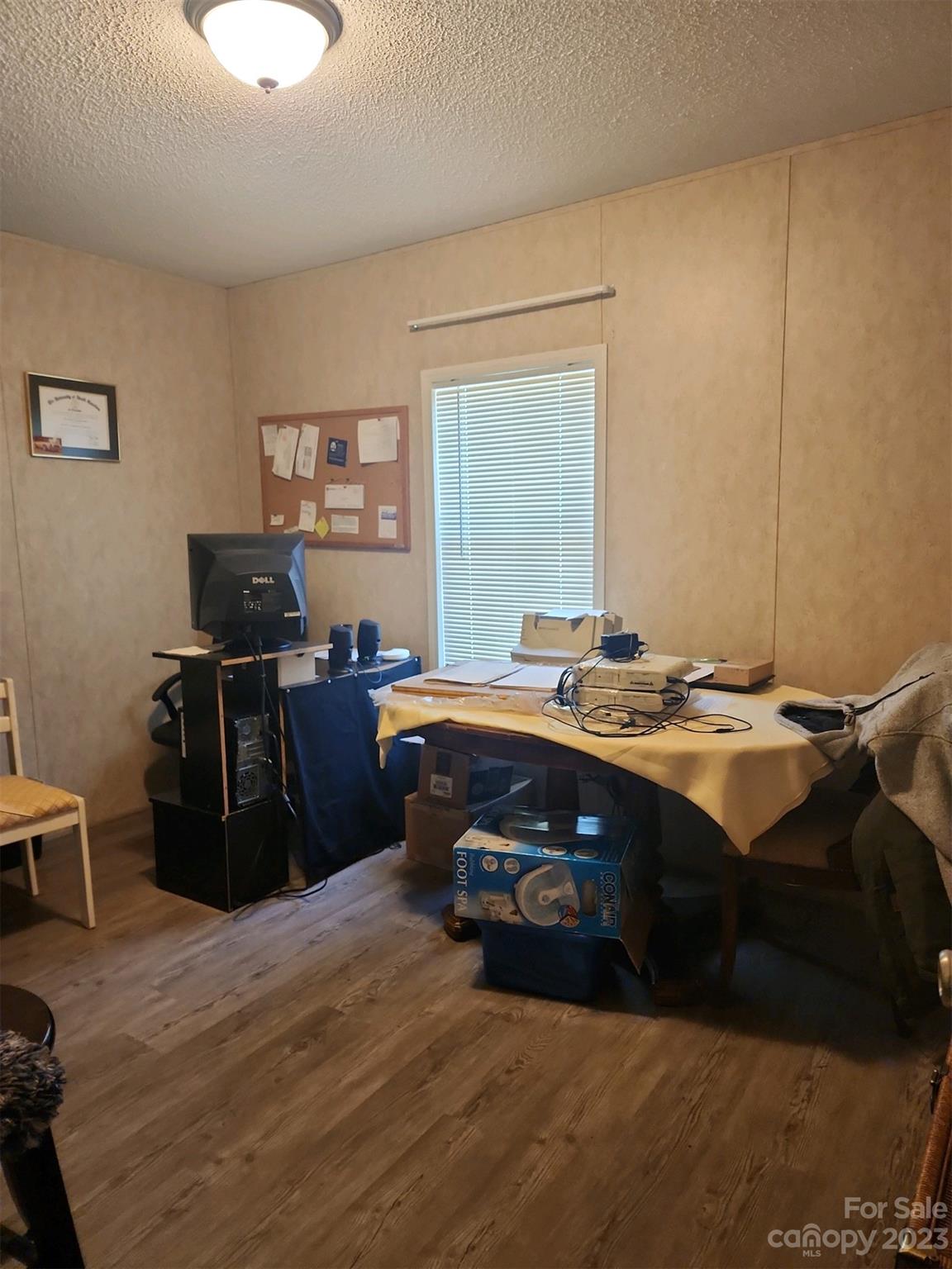 626 Union School Road McBee, SC 29101 - Photo 19 of 19 a bedroom with a bed and wooden floor