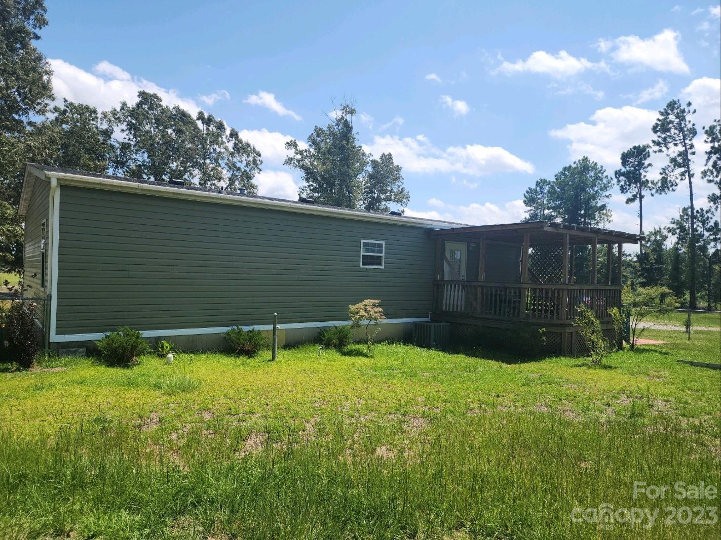 626 Union School Road McBee, SC 29101 - Photo 2 of 19 a view of house with backyard