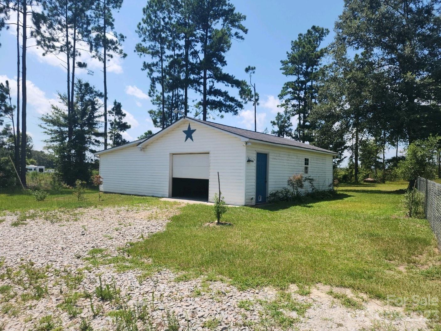 626 Union School Road McBee, SC 29101 - Photo 5 of 19 a house with garden