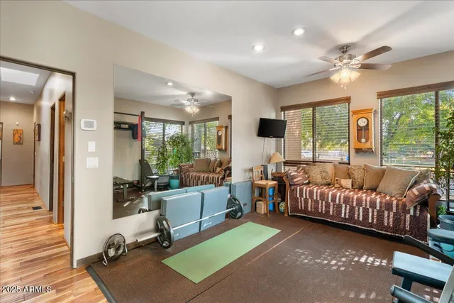 a view of dirt yard with a large tree