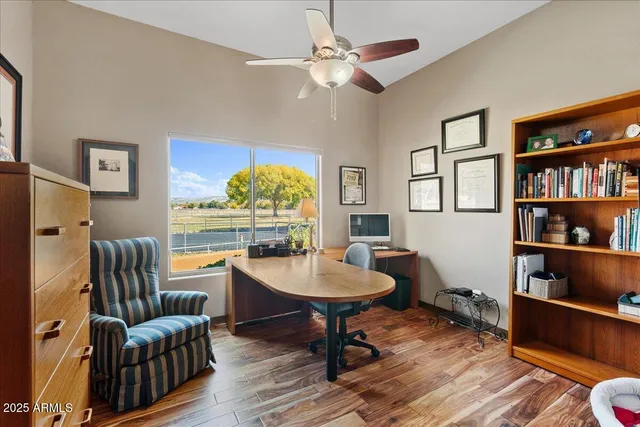 a view of a park with large trees