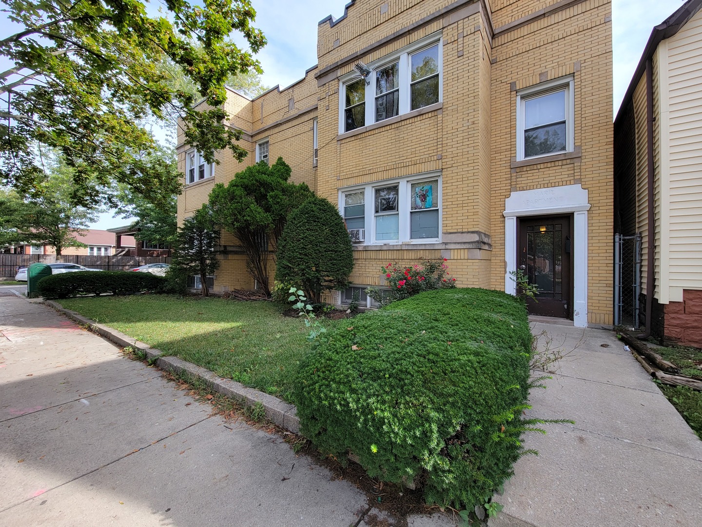 6601 South Troy Street Chicago, IL 60629 - Photo 4 of 5 a front view of a house with a yard