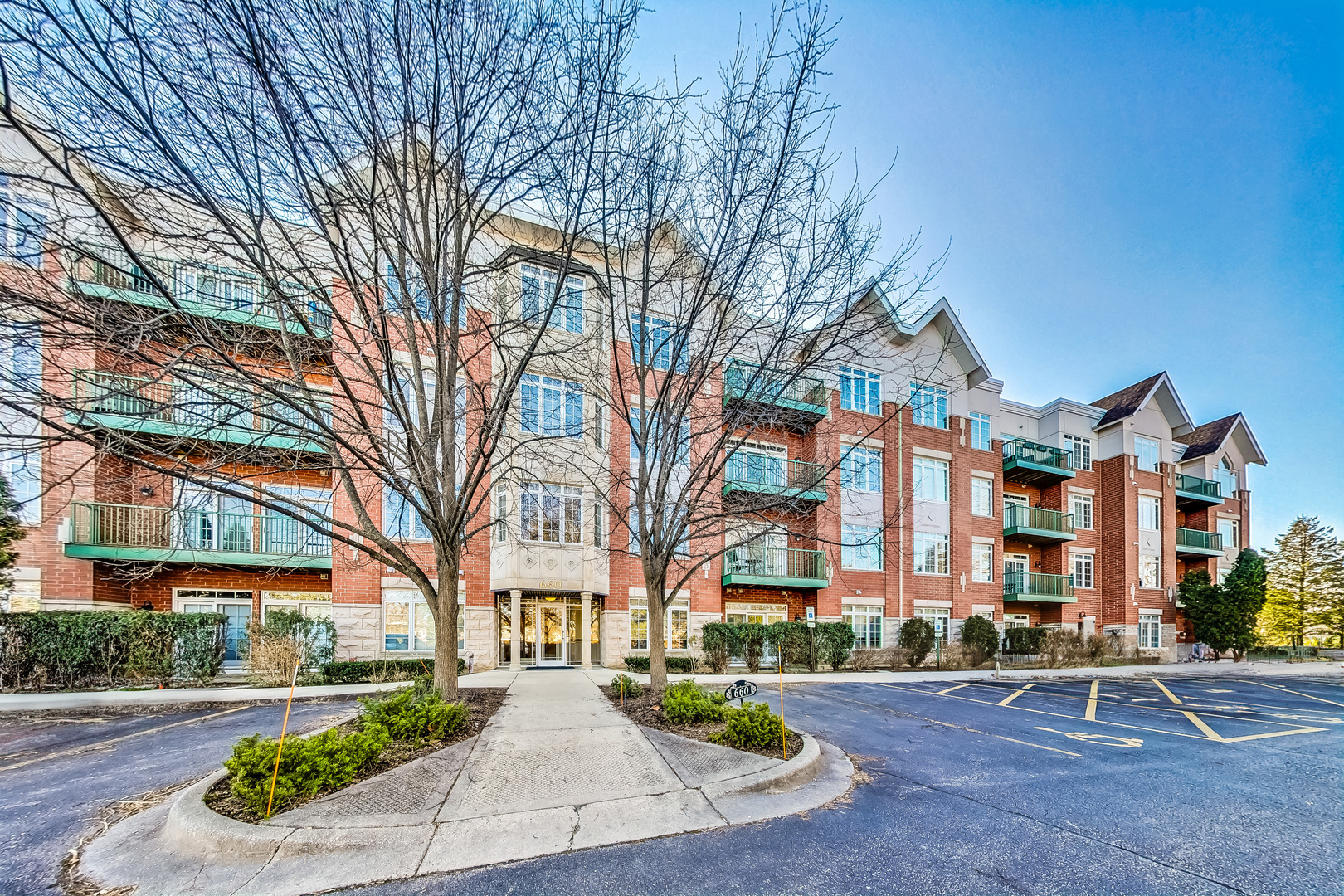 a front view of a building with street view