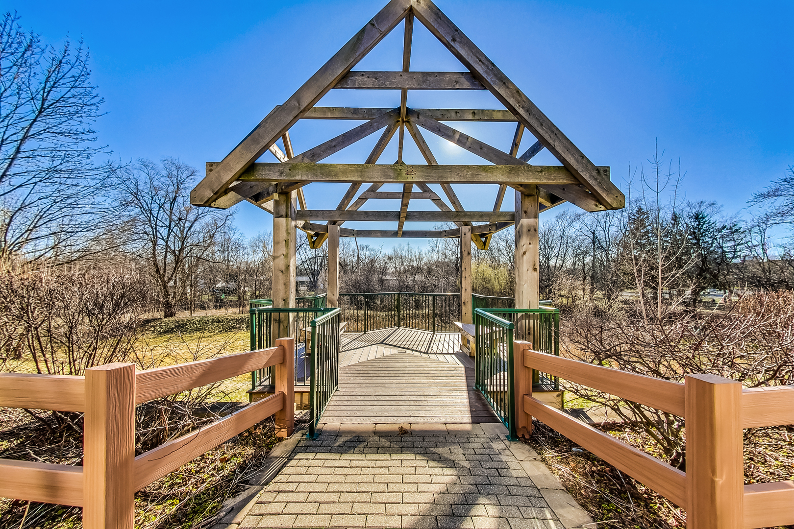 660 McHenry Road, Unit 1102 Wheeling, IL 60090 - Photo 18 of 19 a view of a large brick building next to a yard