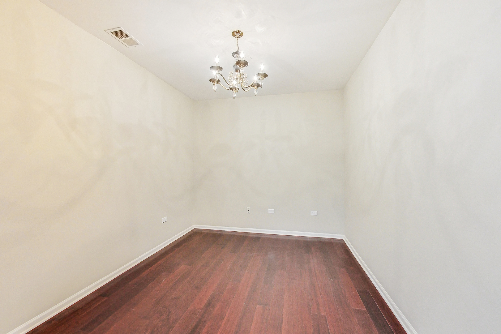 660 McHenry Road, Unit 1102 Wheeling, IL 60090 - Photo 9 of 19 a view of wooden floor in a room