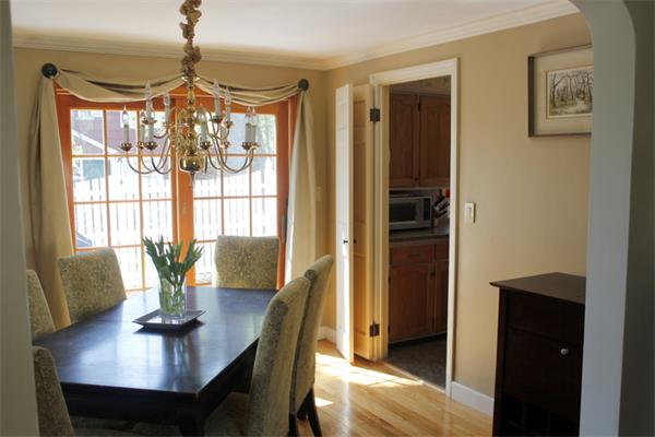 16 Cooper Street Springfield, MA 01108 - Photo 8 of 23 a view of a dining room with furniture window and wooden floor