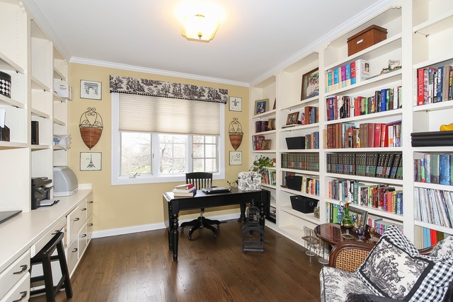 Undisclosed Address Long Grove, IL 60047 - Photo 13 of 25 a view of a workspace with furniture and a book shelf