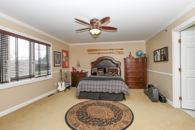 Undisclosed Address Long Grove, IL 60047 - Photo 16 of 25 a living room with furniture a rug and a window