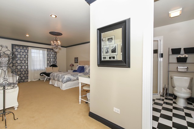 Undisclosed Address Long Grove, IL 60047 - Photo 18 of 25 a living room with furniture and a painting on the wall