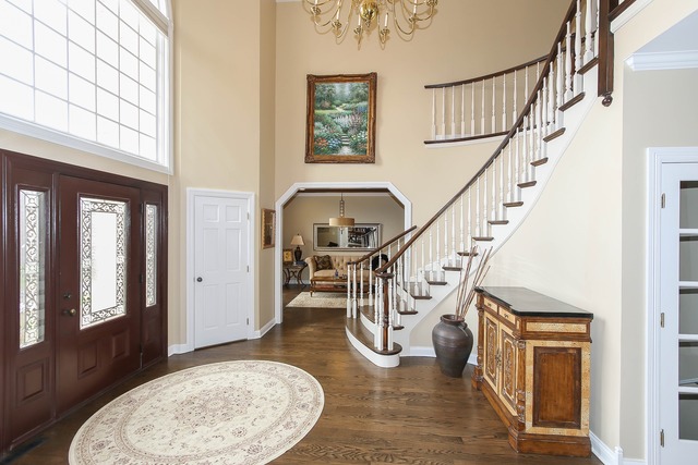 Undisclosed Address Long Grove, IL 60047 - Photo 2 of 25 a view of entryway and hall with wooden floor