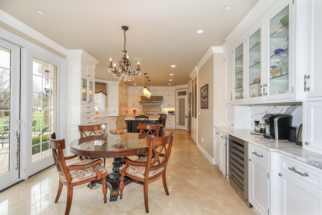 Undisclosed Address Long Grove, IL 60047 - Photo 8 of 25 a view of a dining room with furniture and chandelier