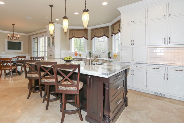 Undisclosed Address Long Grove, IL 60047 - Photo 10 of 25 a kitchen with a table chairs sink and cabinets