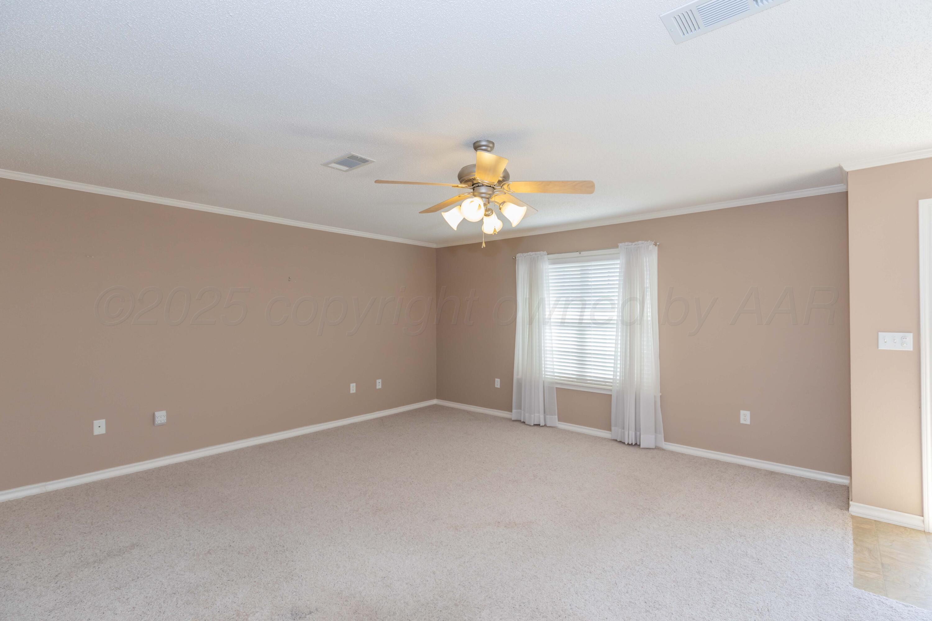 109 Texas Avenue Groom, TX 79039 - Photo 4 of 21 a view of an empty room with a window