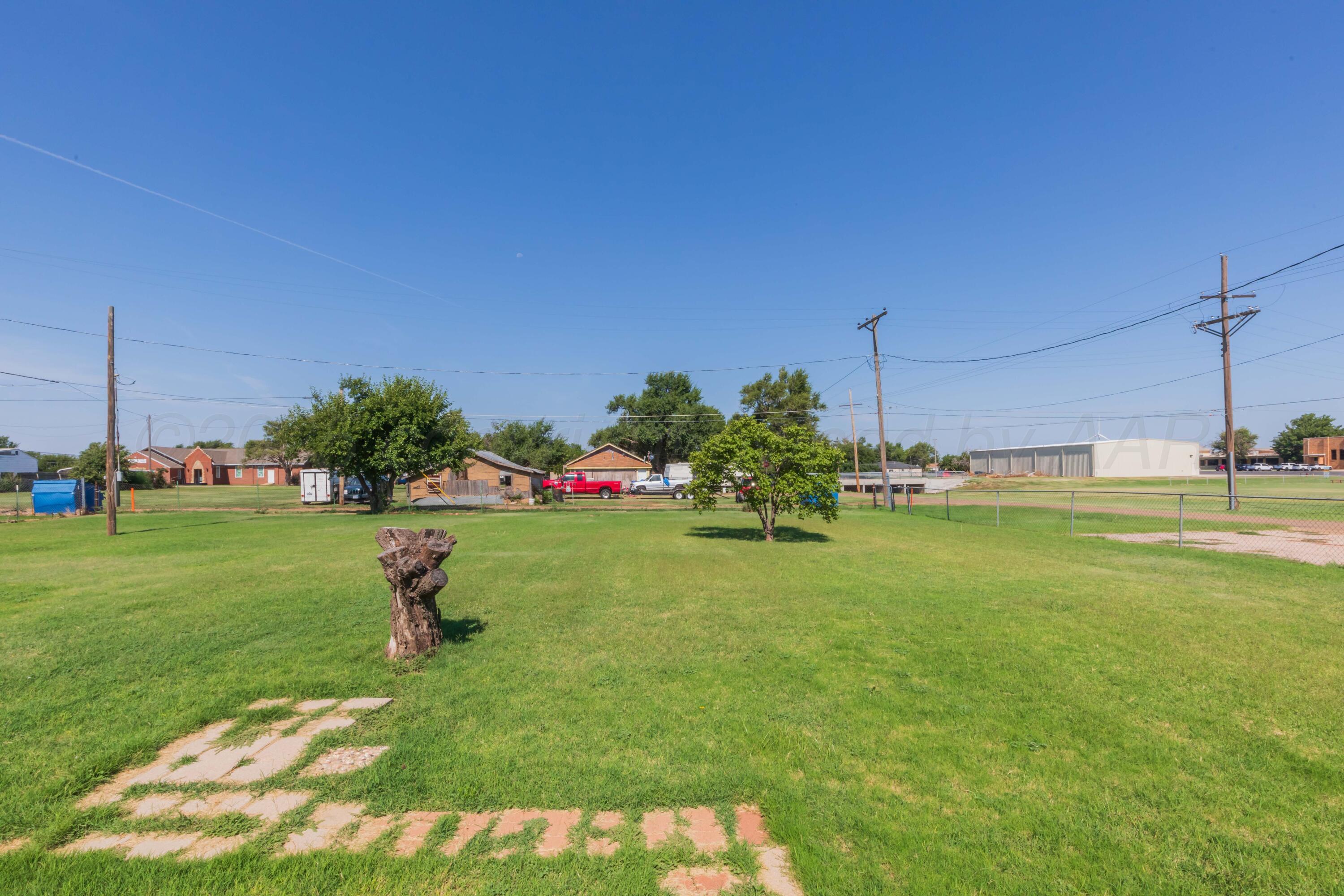 109 Texas Avenue Groom, TX 79039 - Photo 7 of 21 a view of a golf course with a lake