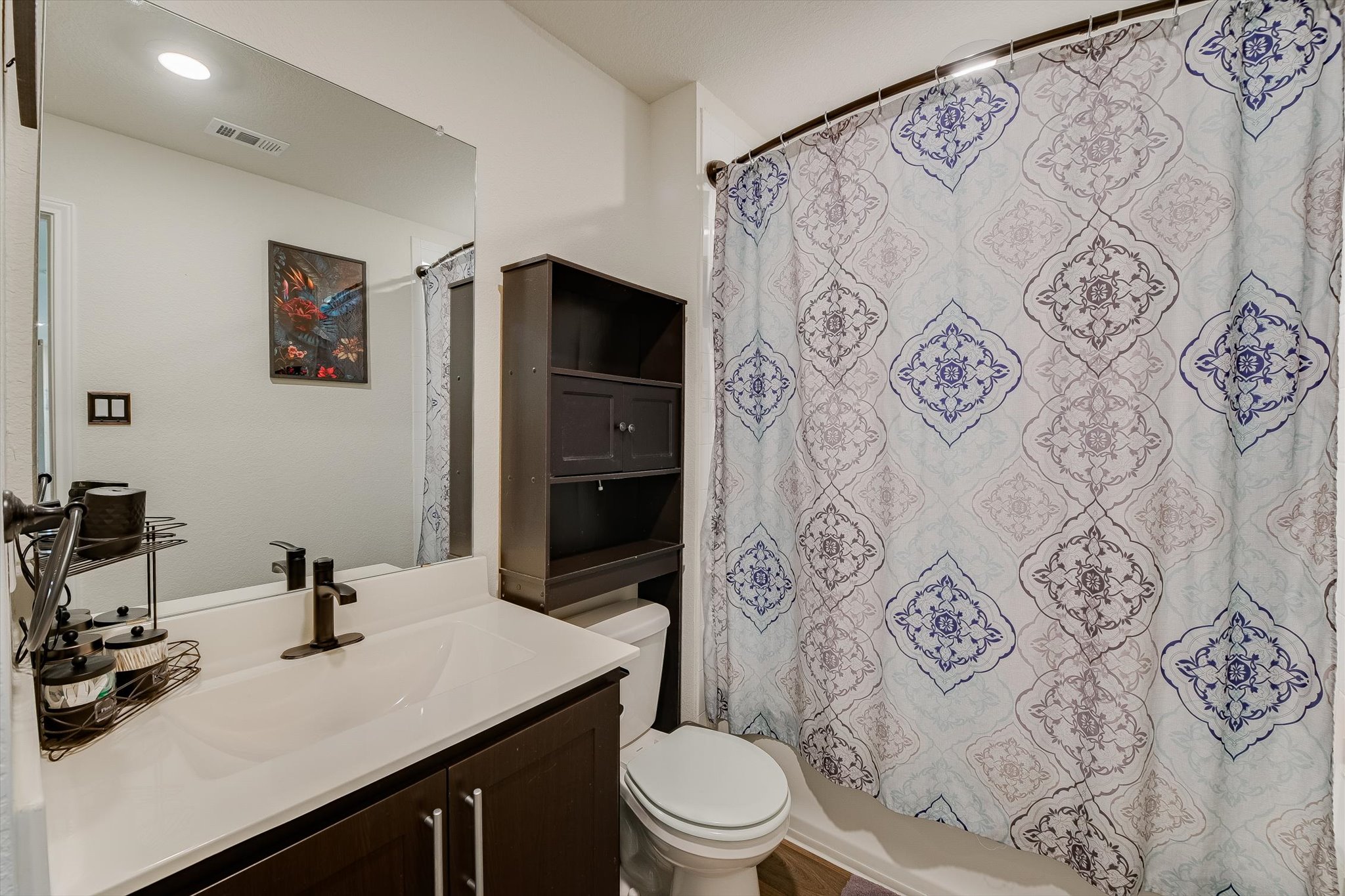 232 Euclid Lane Kyle, TX 78640 - Photo 12 of 15 a bathroom with a sink toilet and shower