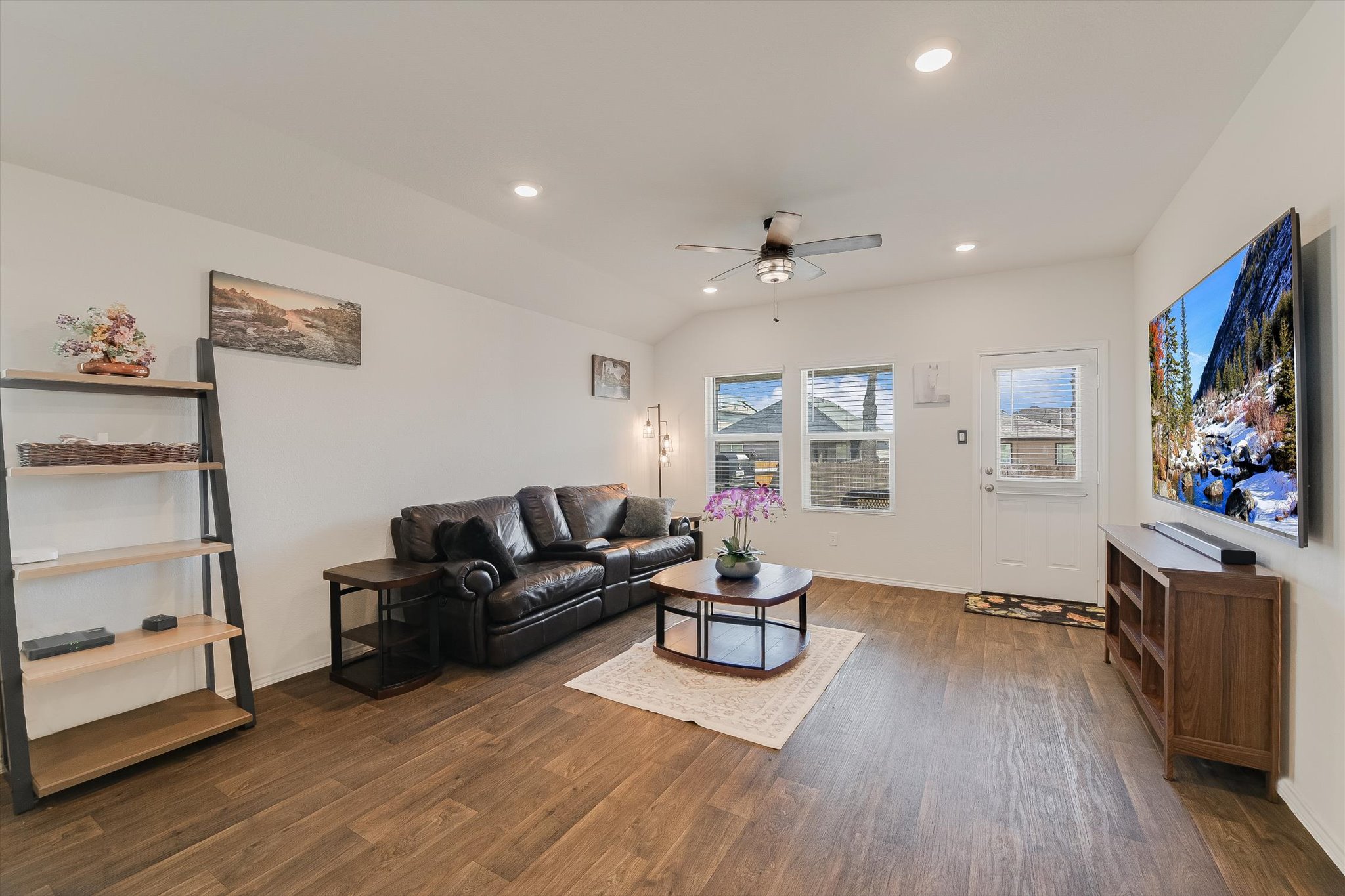 232 Euclid Lane Kyle, TX 78640 - Photo 3 of 15 a living room with furniture and a flat screen tv