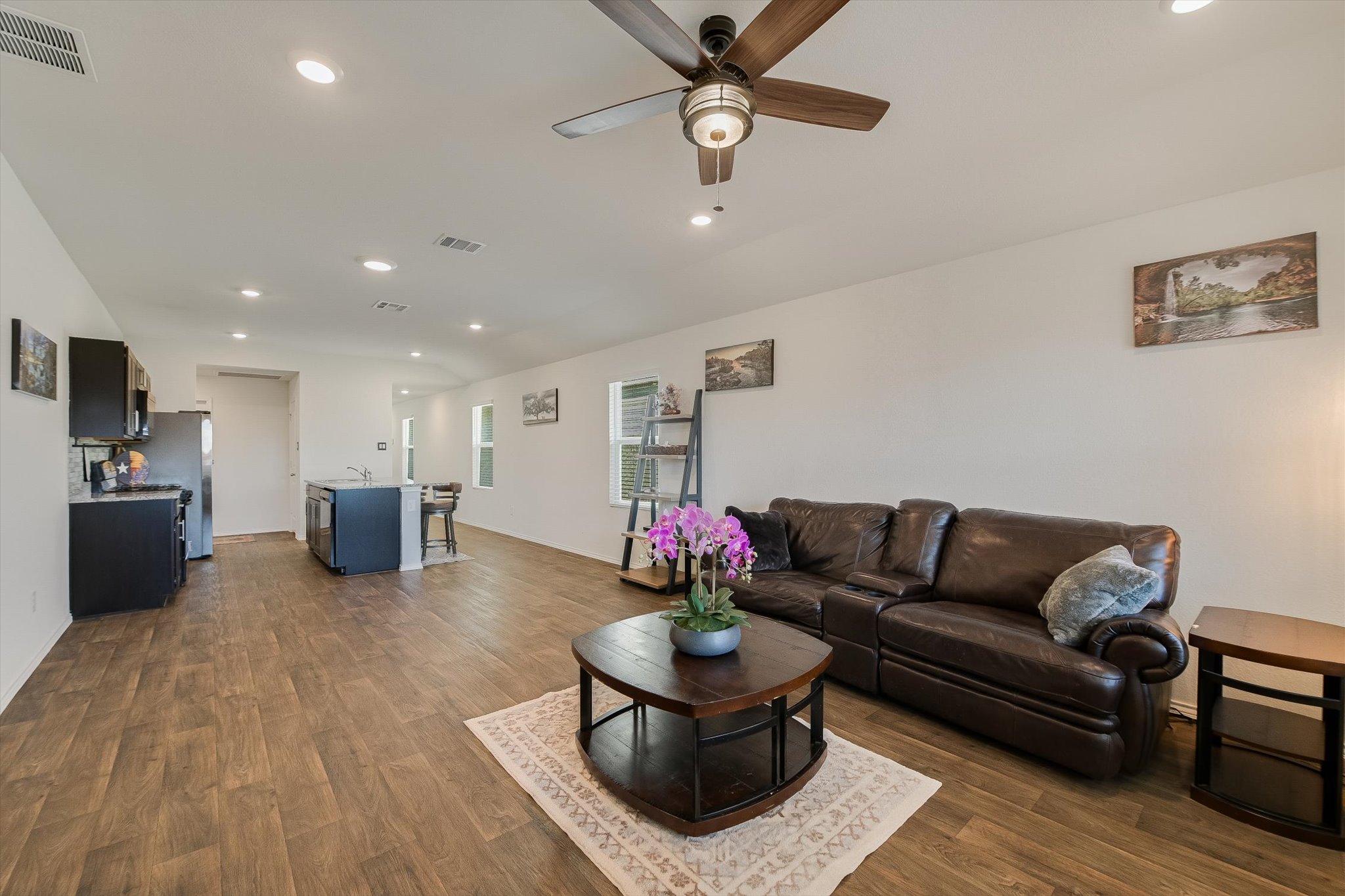 232 Euclid Lane Kyle, TX 78640 - Photo 4 of 15 a living room with furniture and kitchen view