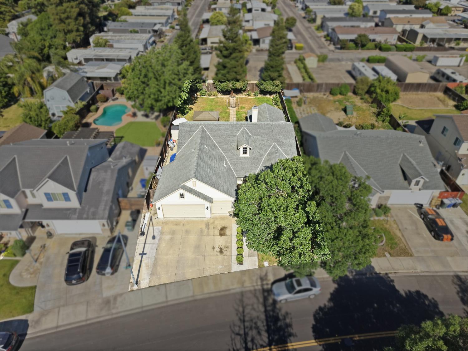 2220 Ellison Drive Modesto, CA 95355 - Photo 52 of 53 an aerial view of a house with a yard