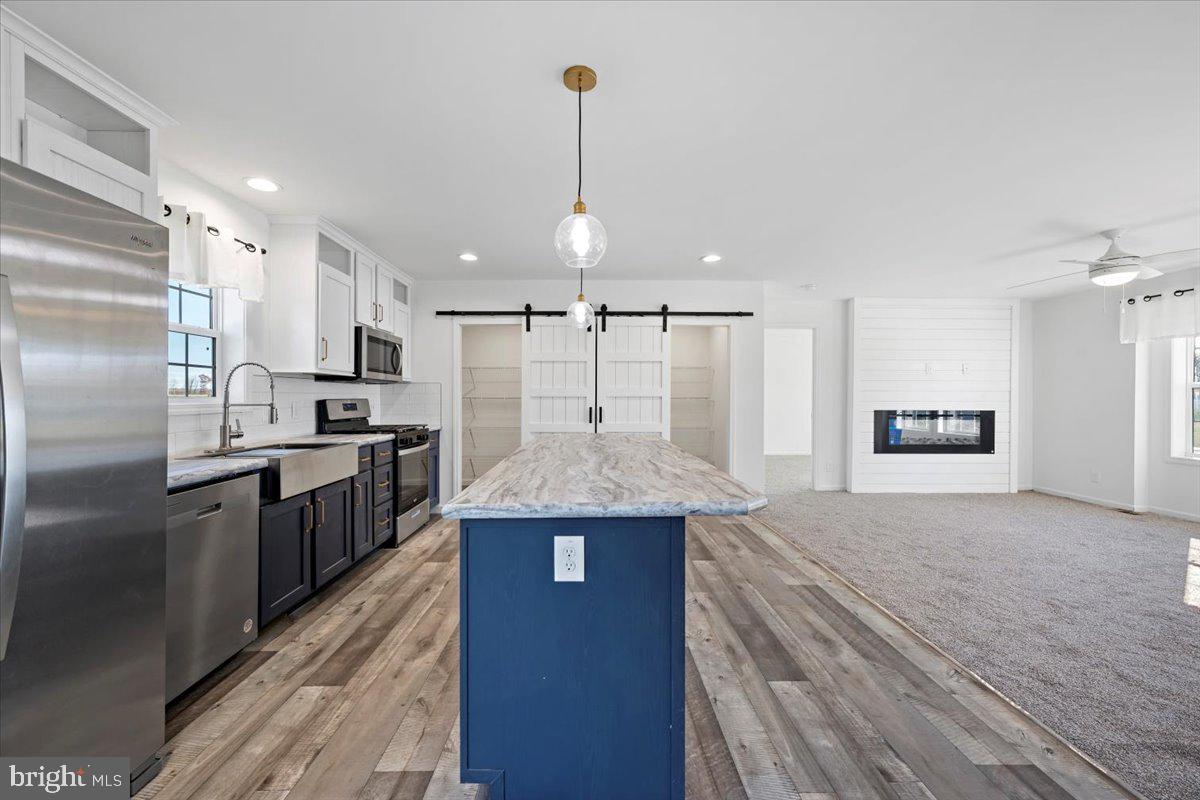 1410 Heytesbury Road Walnutport, PA 18088 - Photo 12 of 37 Modern kitchen with open layout charm.