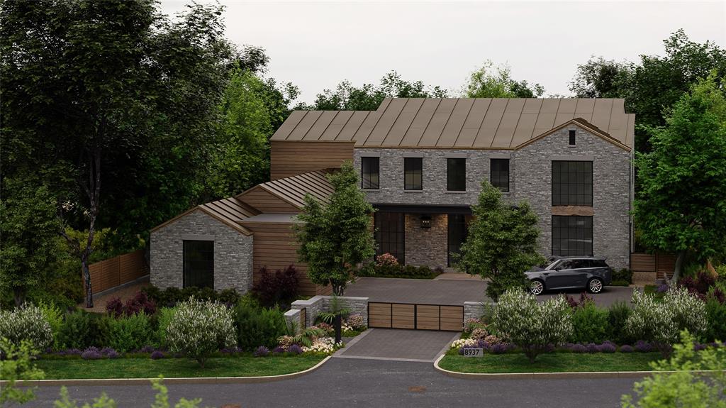 a front view of house with a garden