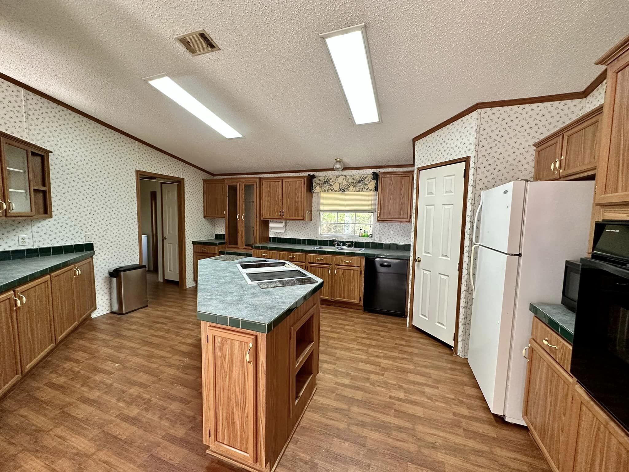 456 Corbin Gainey Road DeFuniak Springs, FL 32435 - Photo 6 of 15 359842808_10227119289385272_366464144558