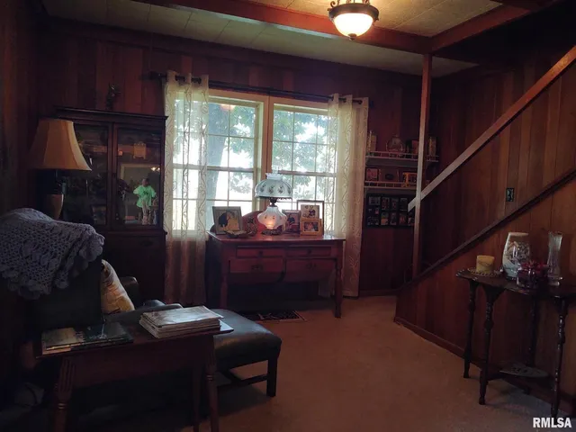 a room with furniture and a window