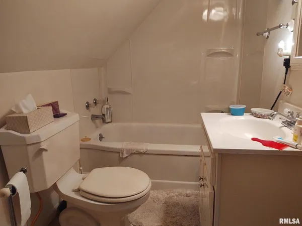 a bathroom with a sink and a toilet