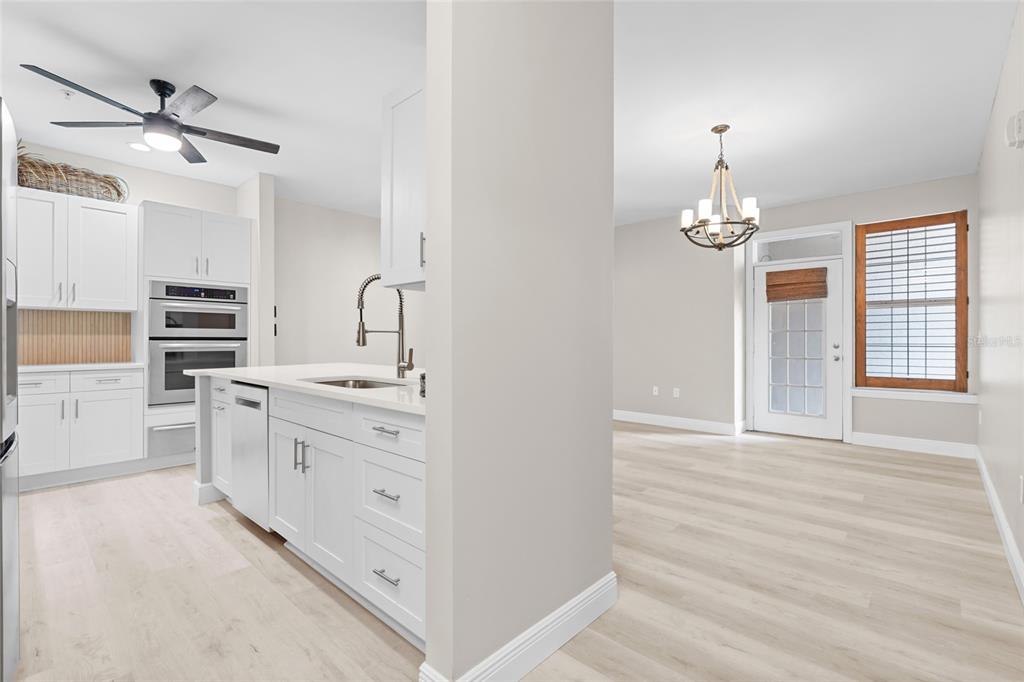 4221 West Spruce Street, Unit 1108 Tampa, FL 33607 - Photo 8 of 31 a spacious bathroom with a double vanity sink a mirror and a shower
