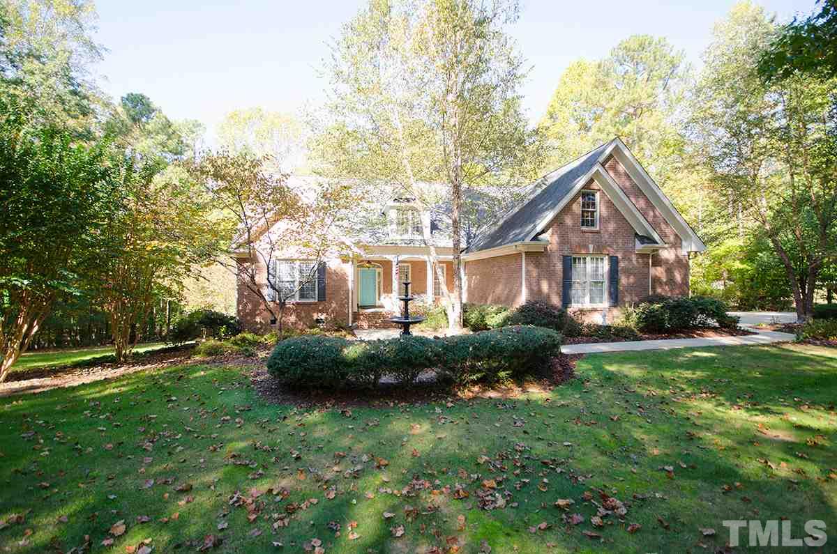 1106 Stanridge Drive Raleigh, NC 27613 - Photo 1 of 24 a front view of a house with garden