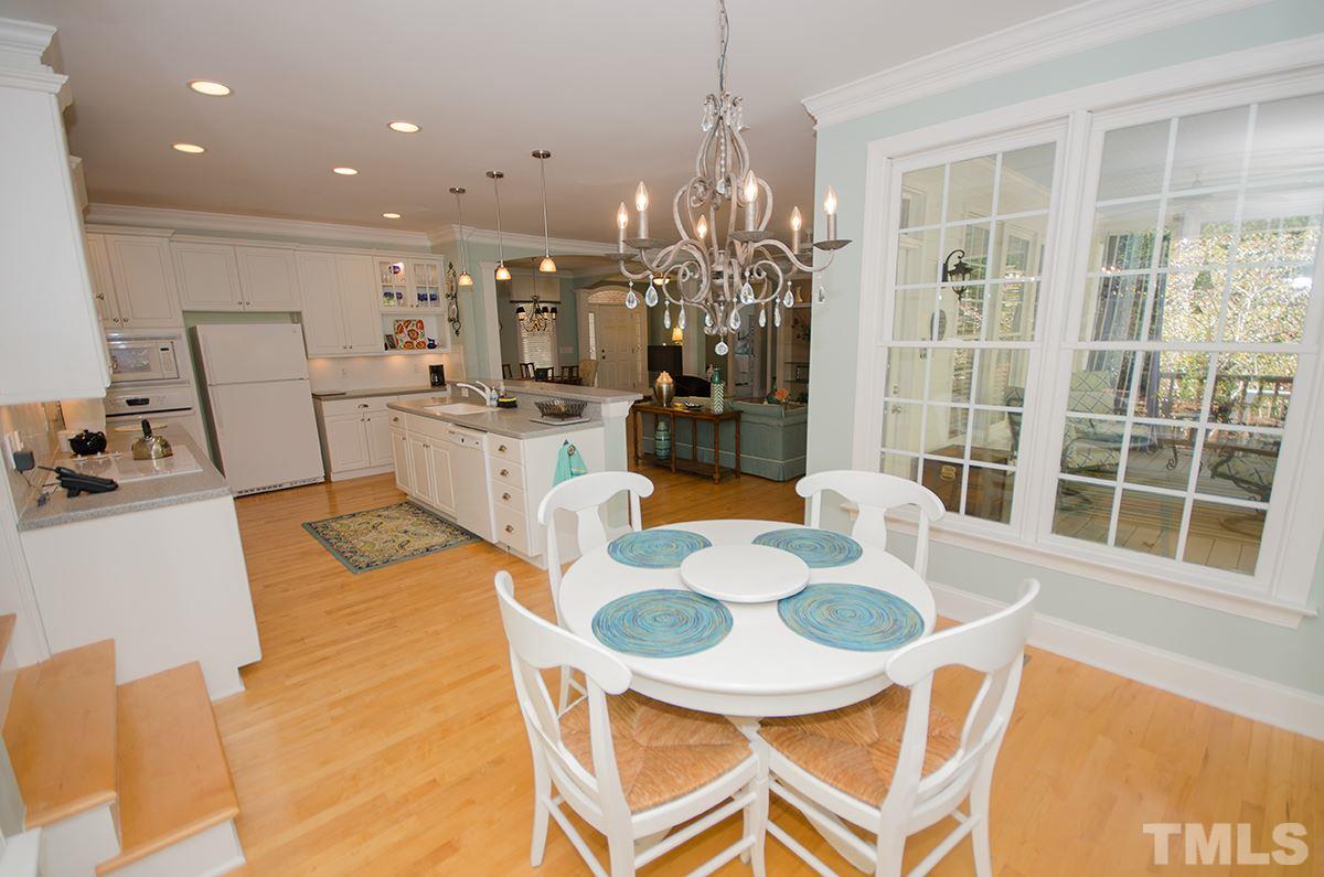 1106 Stanridge Drive Raleigh, NC 27613 - Photo 11 of 24 a dining room with furniture and window