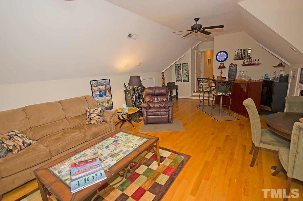 1106 Stanridge Drive Raleigh, NC 27613 - Photo 18 of 24 a living room with furniture and wooden floor