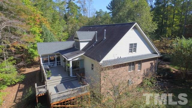 1106 Stanridge Drive Raleigh, NC 27613 - Photo 23 of 24 a view of a house with a yard