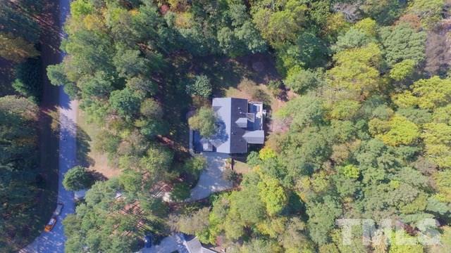 1106 Stanridge Drive Raleigh, NC 27613 - Photo 4 of 24 an aerial view of a house with a yard