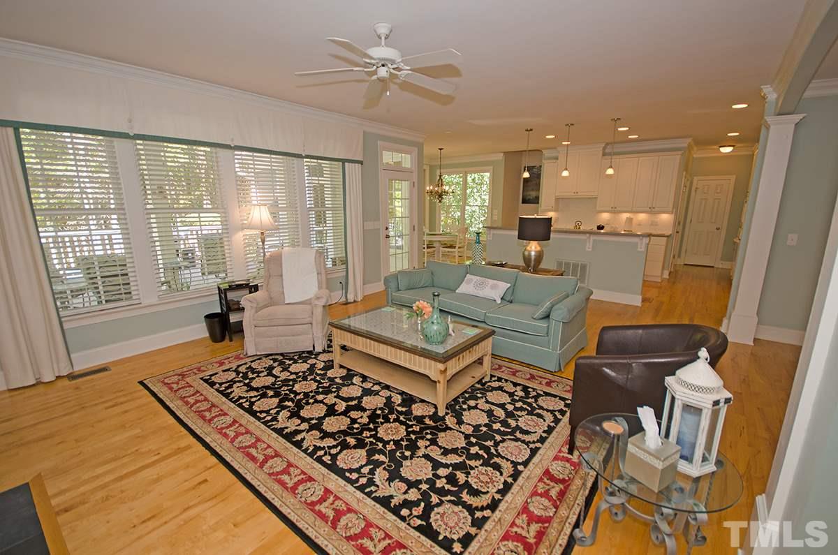 1106 Stanridge Drive Raleigh, NC 27613 - Photo 8 of 24 a living room with furniture and a rug