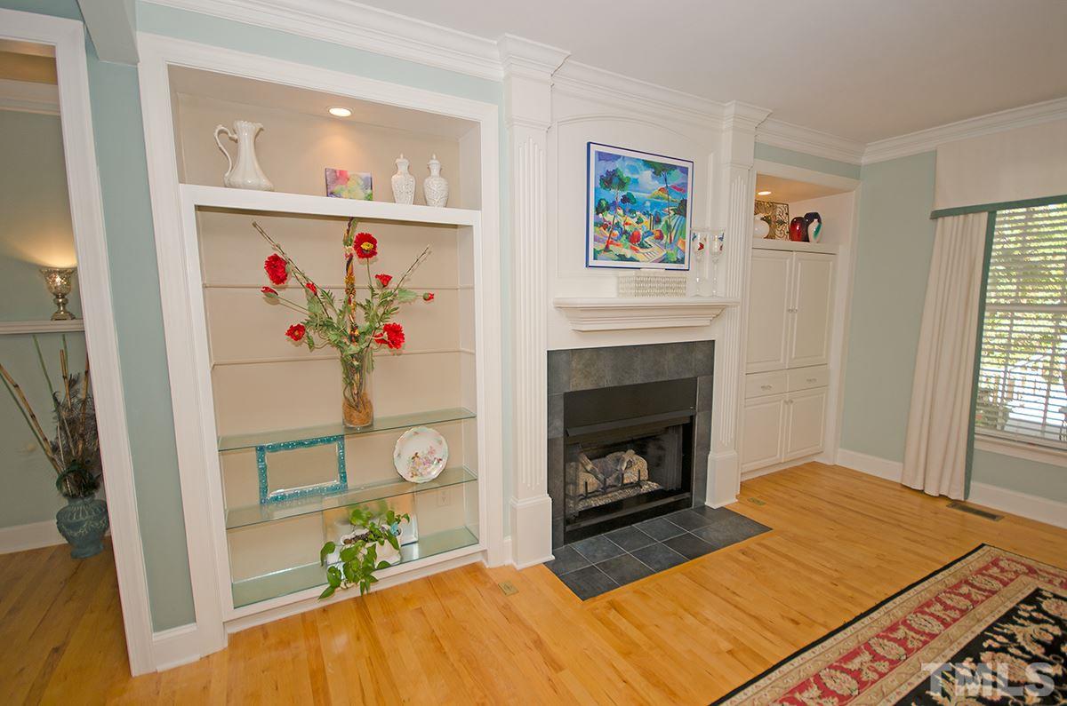 1106 Stanridge Drive Raleigh, NC 27613 - Photo 9 of 24 a living room with furniture and a fireplace
