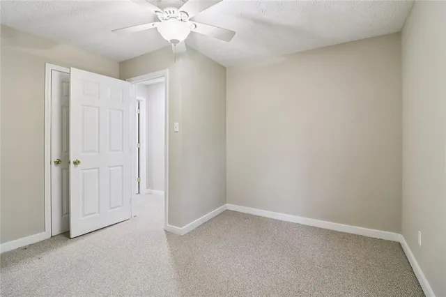 a view of kitchen with cabinets and wooden floor