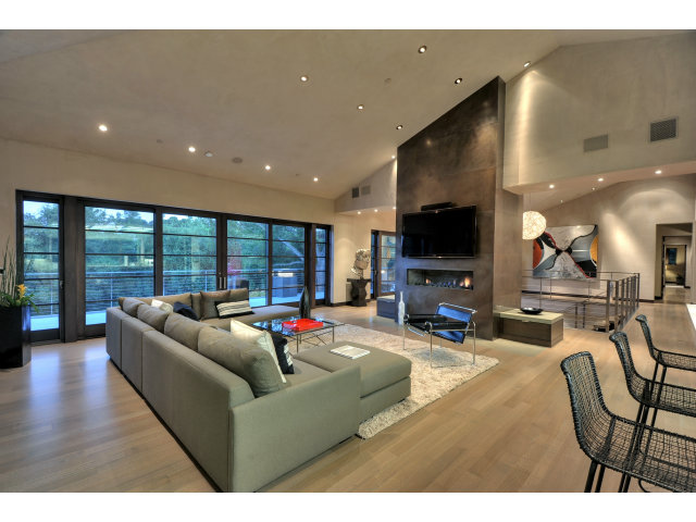 11580 Old Ranch Road Los Altos Hills, CA 94024 - Photo 15 of 22 a living room with furniture and a flat screen tv