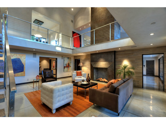 11580 Old Ranch Road Los Altos Hills, CA 94024 - Photo 16 of 22 a living room with furniture and a chandelier