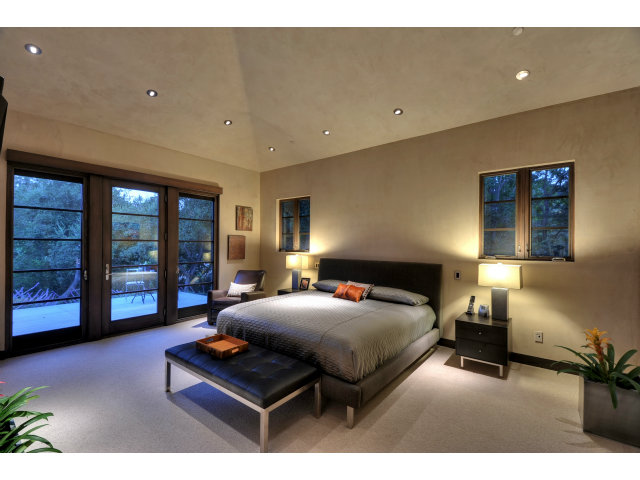 11580 Old Ranch Road Los Altos Hills, CA 94024 - Photo 22 of 22 a bedroom with a bed window and a dresser
