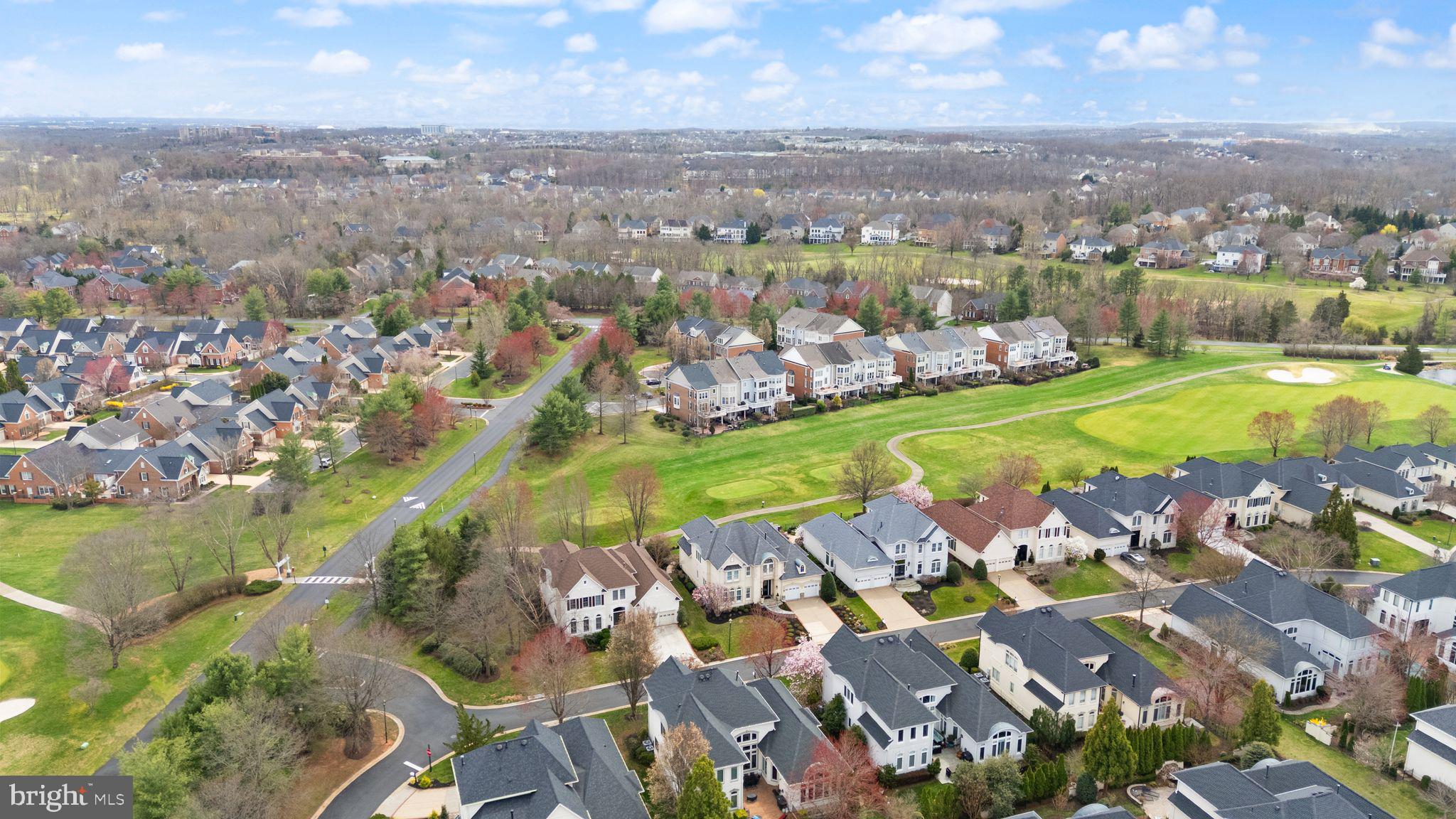 43524 Jackson Hole Circle Leesburg, VA 20176 - Photo 136 of 149 an aerial view of a house with a swimming pool yard and outdoor seating