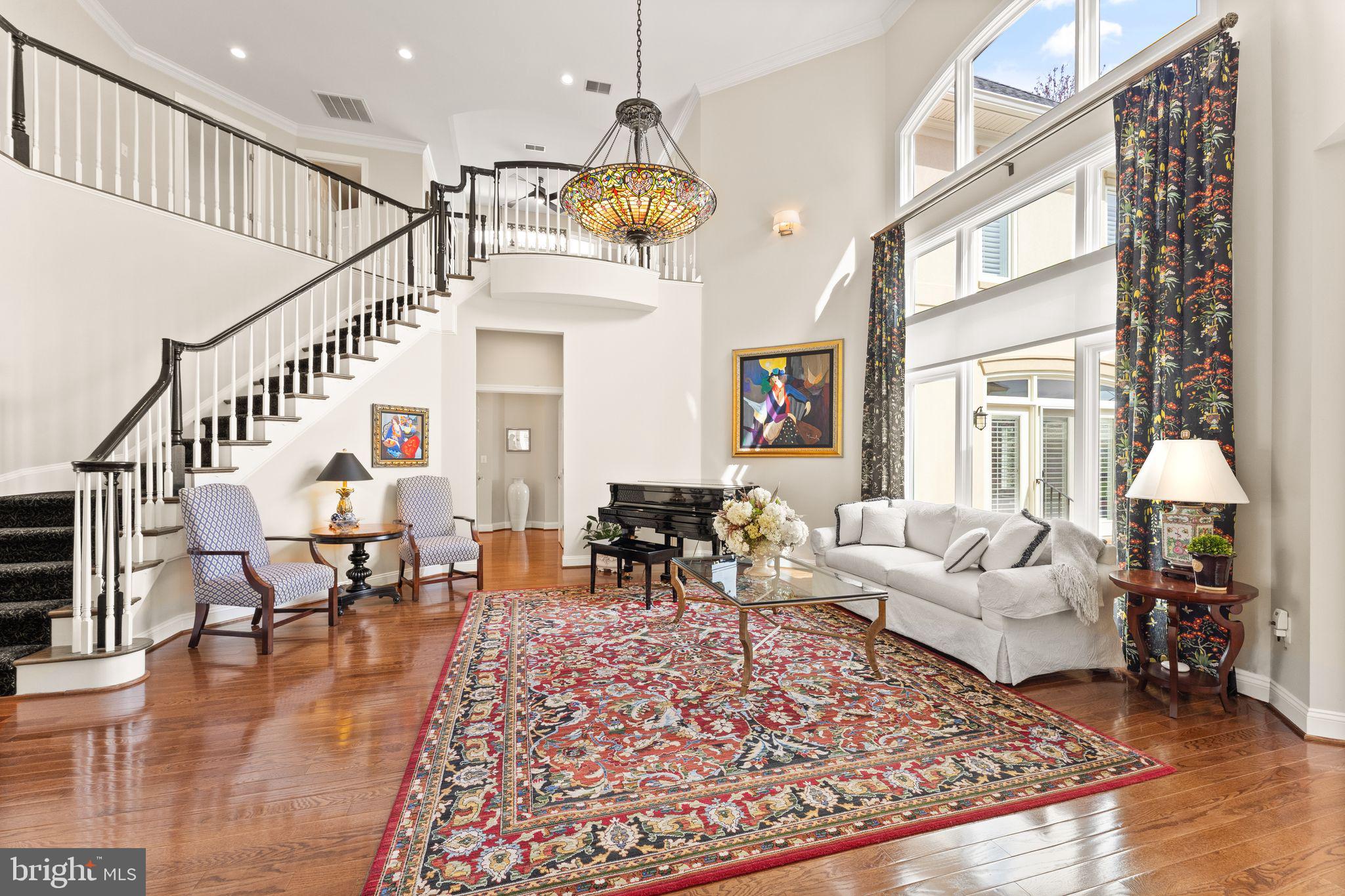 43524 Jackson Hole Circle Leesburg, VA 20176 - Photo 22 of 149 a living room with fireplace furniture and a wooden floor