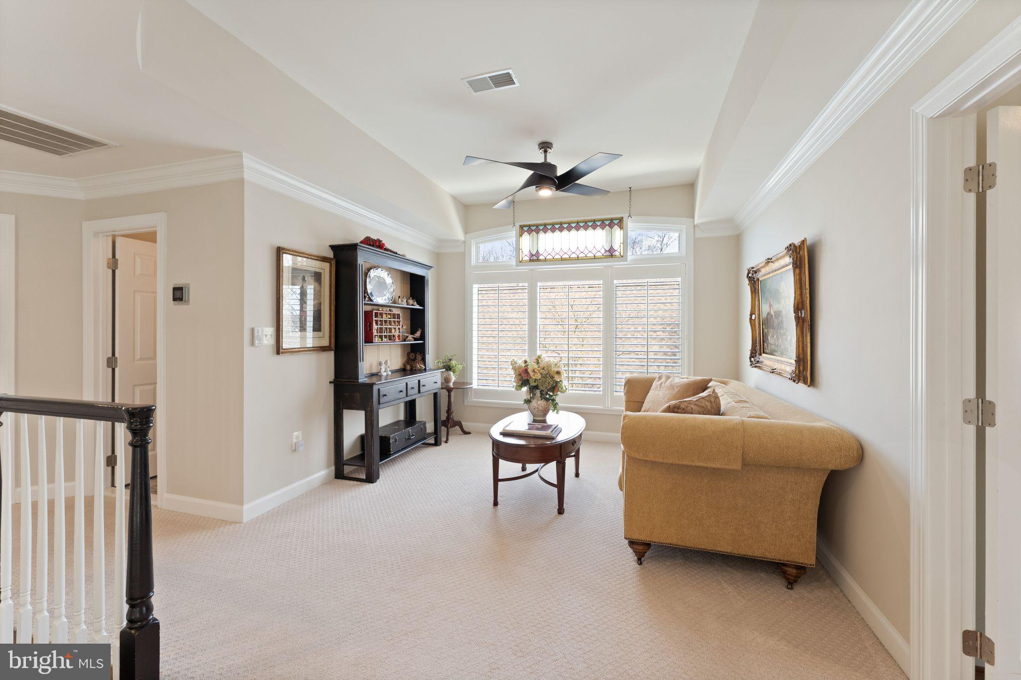 43524 Jackson Hole Circle Leesburg, VA 20176 - Photo 47 of 149 a living room with furniture and a large window
