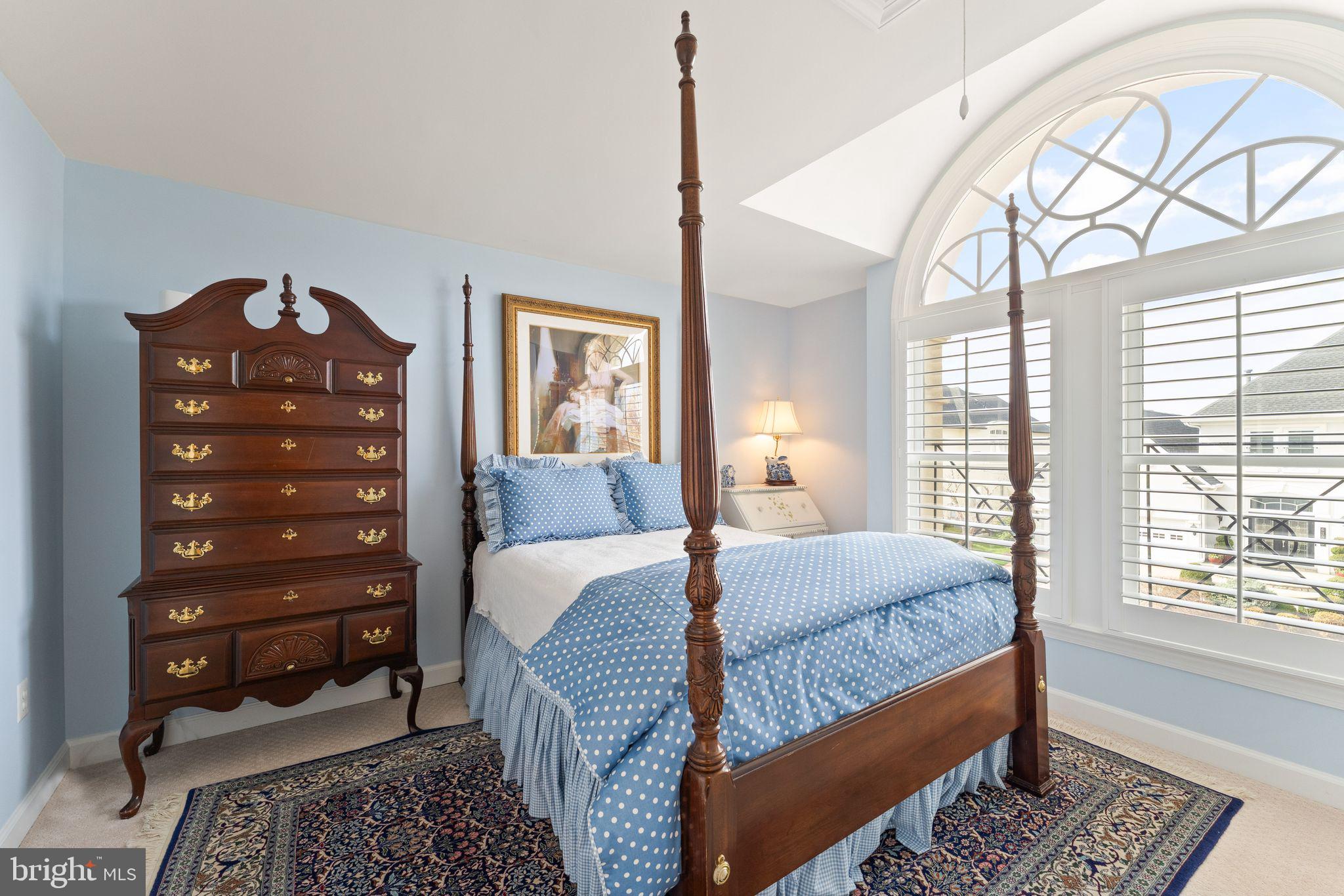 43524 Jackson Hole Circle Leesburg, VA 20176 - Photo 59 of 149 a bedroom with a bed a dresser and a window