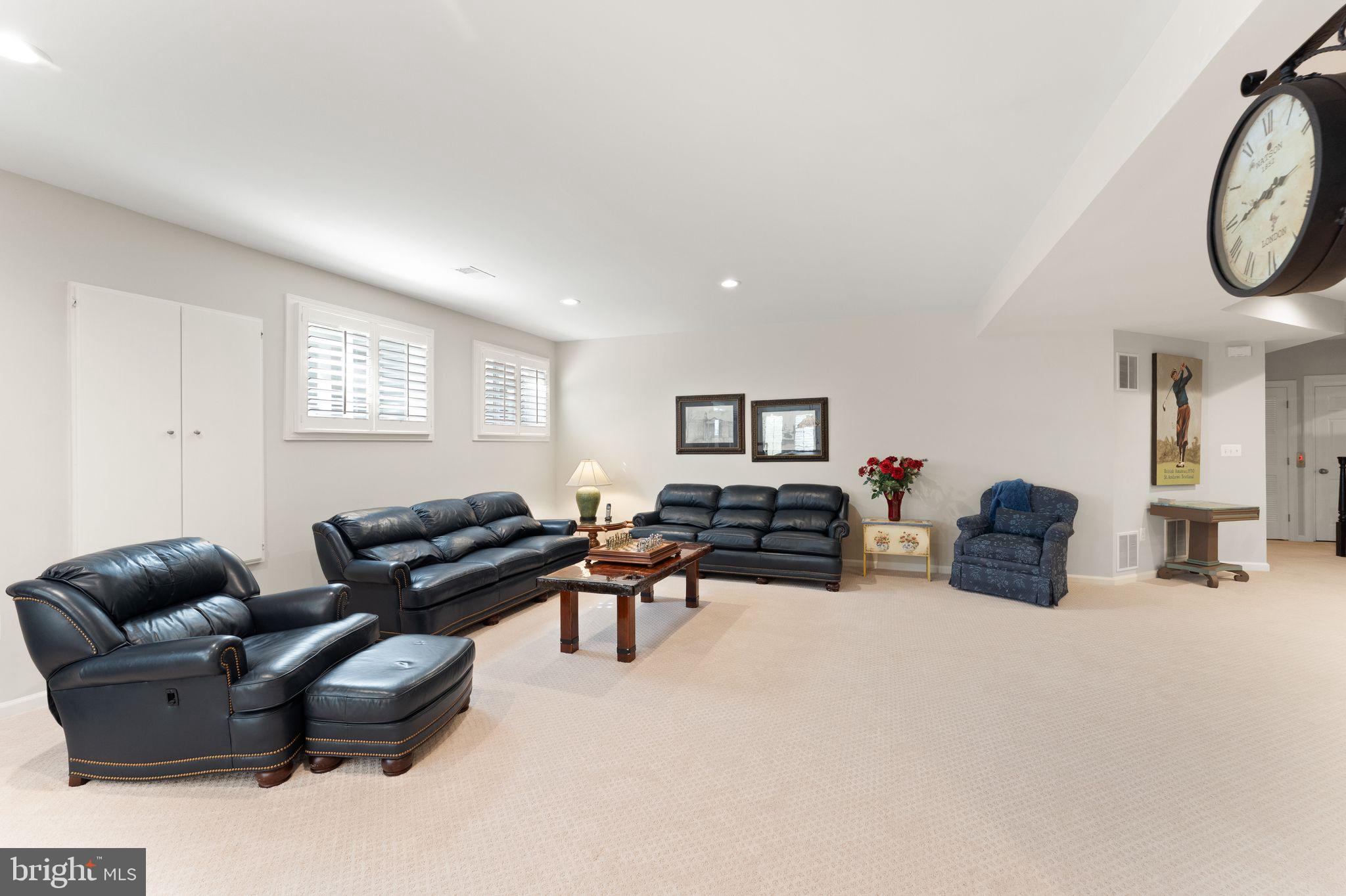 43524 Jackson Hole Circle Leesburg, VA 20176 - Photo 67 of 149 a living room with furniture a rug and a window